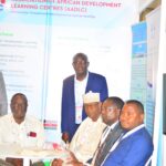 AADLC representatives at eLearning Africa 2025 booth